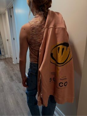 Peach Smiley Face Graphic Hoodie